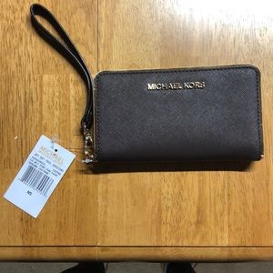 Wristlet by Michael kors